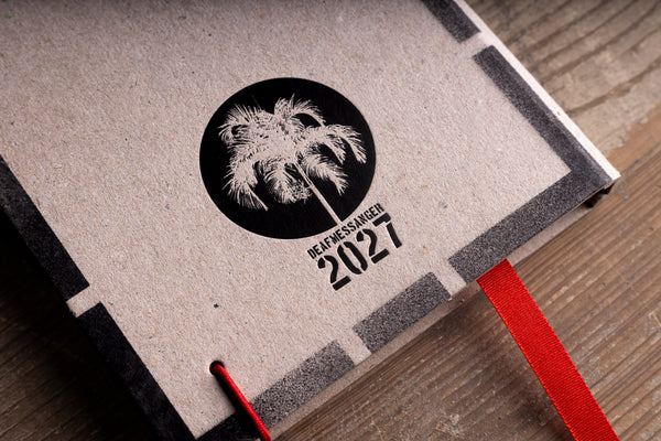 back-cover-logo.jpg — Close-up of Deafmessanger 2027 palm tree logo on the diary back cover