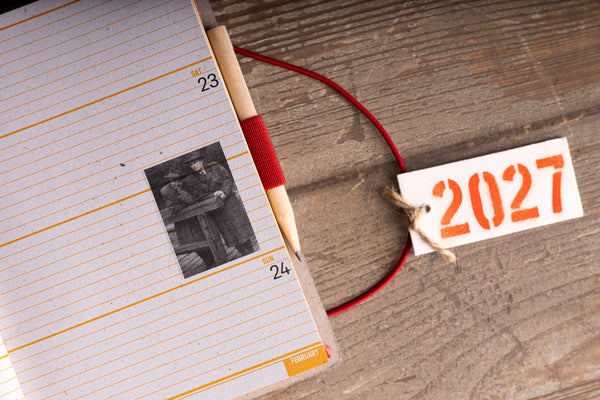 february-photo-insert.jpg — February diary page with a small vintage black-and-white photo insert