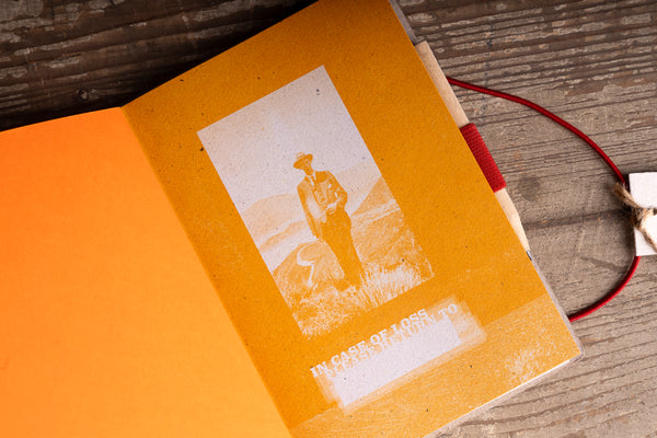 inside-back-cover-pocket.jpg — Inside back cover of diary with "In case of loss please return to" and vintage photo insert