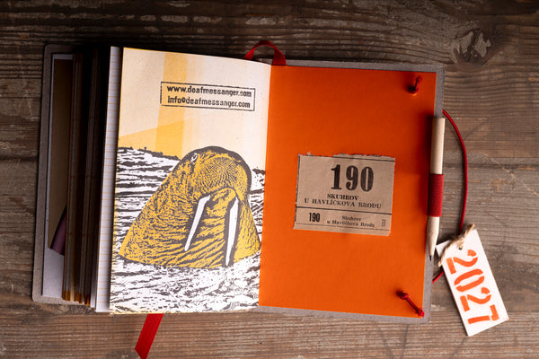 walrus-illustration-ephemera.jpg — Diary spread with a walrus illustration and a vintage paper label glued inside