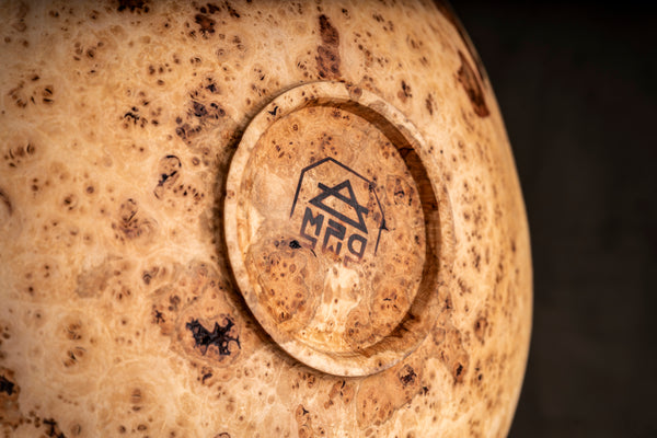 Hand-turned maple burl bowl Evie with a raw, honest natural edge finish.
