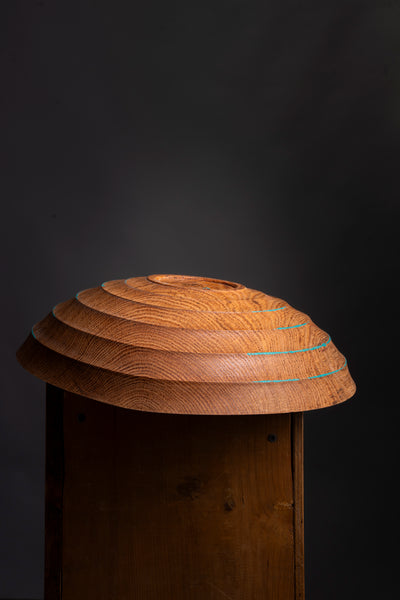Angled view of MATTEA one-of-a-kind oak bowl