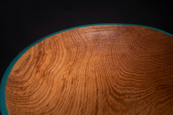 Interior detail of MATTEA oak bowl with honey-toned wood grain