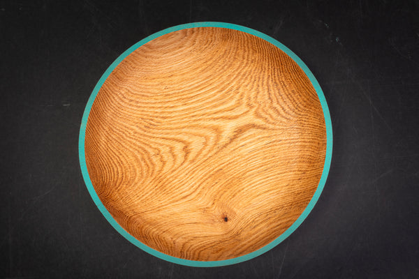 Close-up of the warm honey grain on the Chase oak bowl