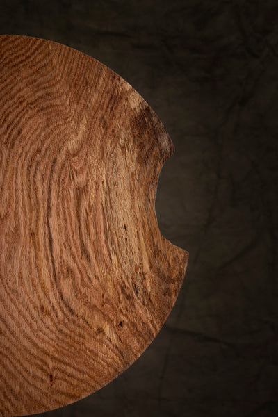 Thin-walled oak bowl turned from a single piece of wood
